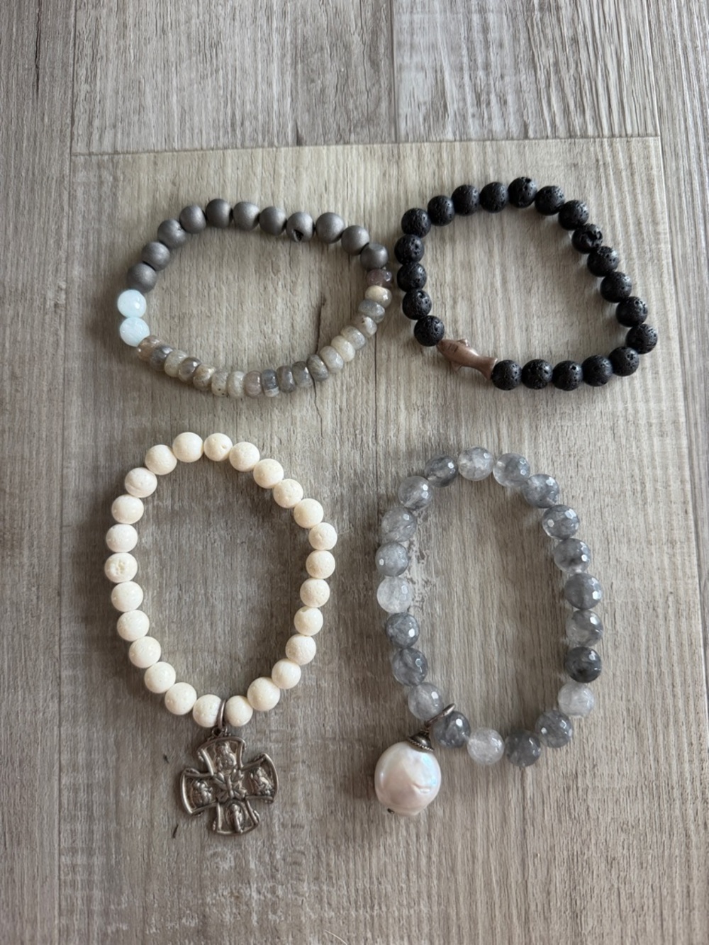 Set of four chunky stone beaded charm bracelets